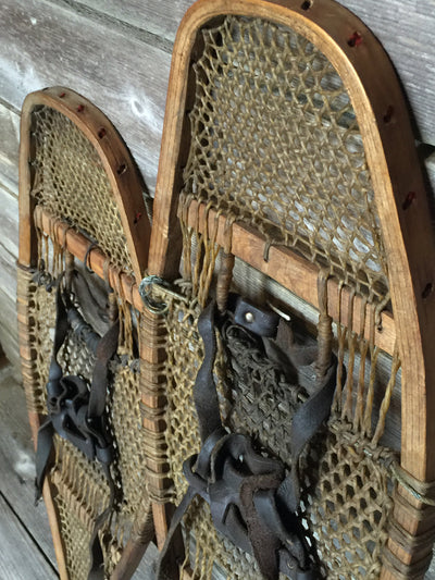 Antique Native American Snowshoes with pom poms