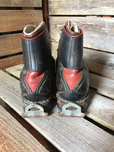 Classic Black Leather Ski Boots with Red Accents