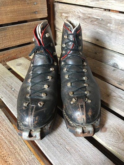 Classic Black Leather Ski Boots with Red Accents