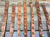 Sleigh Bells - 9 sets of brass bell strands on vintage brown leather in varying sizes