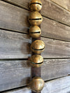 Sleigh Bells - Strap of 19 Bells attached to 90 inch Vintage Leather Strap